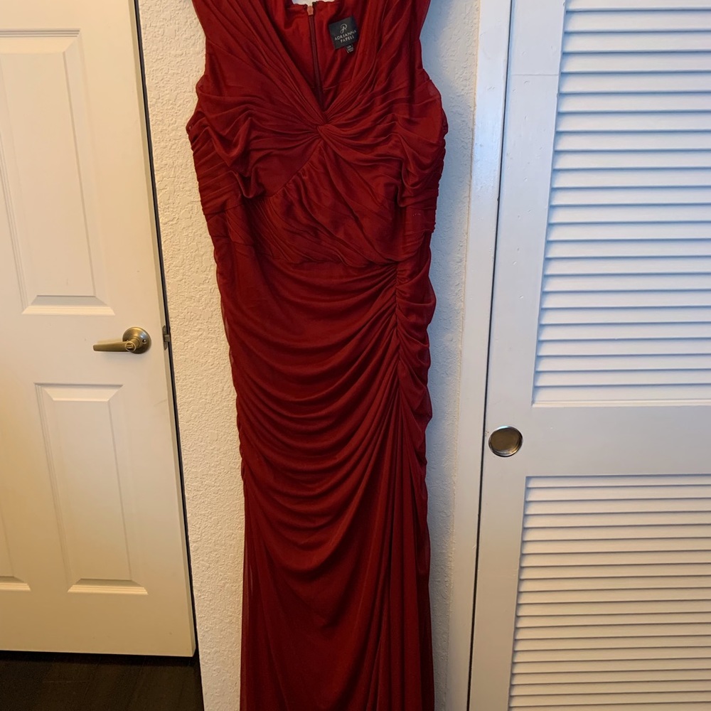 Elegant, Christmas-red Adrianna Papell gown.
